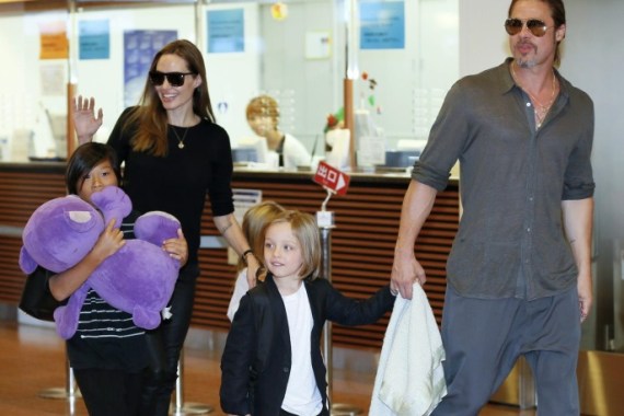 (FILE) A file picture dated 28 July 2013 shows US actors Angelina Jolie (2-L) and Brad Pitt (R) arriving with their children Pax Thien (L), Shiloh (hidden) and Knox Jolie-Pitt at Tokyo International Airport at Haneda, in Tokyo, Japan. According to media reports on 07 November 2016, Jolie's representative announced that the couple reportedly reached a custody agreement of their six children over a week ago after their separation in September 2016.