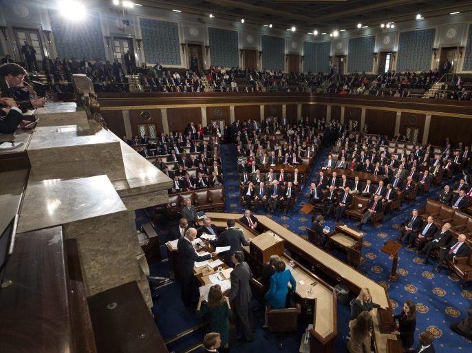 US Vice President Joe Biden receives the official tally of the electoral ballots for the presidency in the House Chamber during a joint session of Congress in the U.S. Capitol in Washington, DC, USA, 06 January 2017. The ballots from the electoral college had been sealed until this vote, which confirmed the election of President-elect Donald Trump.