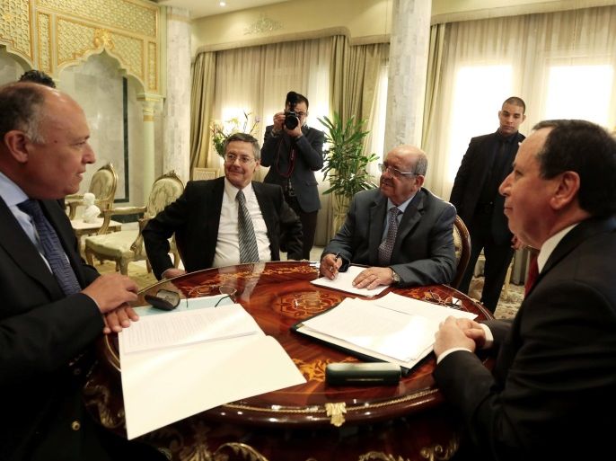 Tunisian Foreign Affairs Minister Khemaies Jhinaoui (R) attends a meeting with his Egyptian counterpart Sameh Shoukry (L) and Algerian Minister of Maghreb Affairs, African Union and Arab League Abdelkader Messahel (2nd R), in Tunis, Tunisia February 19, 2017. REUTERS/Zoubeir Souissi