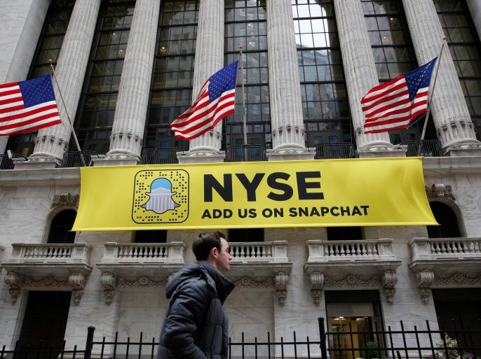 A Snapchat sign hangs on the facade of the New York Stock Exchange (NYSE) in New York City, U.S., January 23, 2017. REUTERS/Brendan McDermid