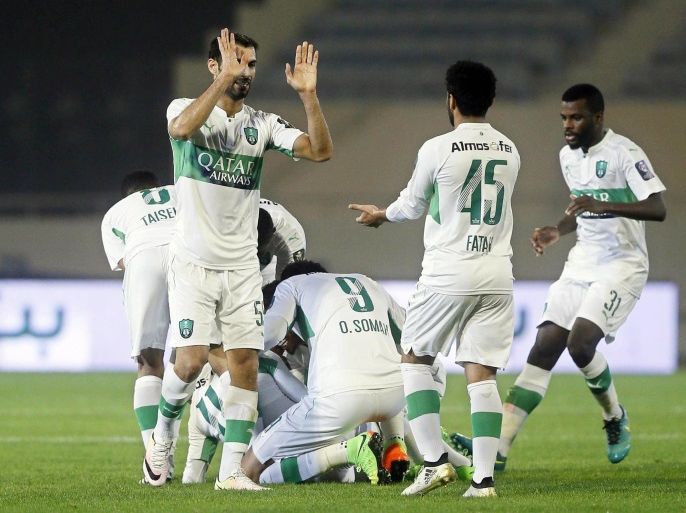 Al-Ahli players celebrate a goal during the Saudi King's Cup round of 16 soccer match between Al-Qadisiyah FC and Al-Ahli S.FC at Prince Saud bin Jalawi Stadium in Al-Khobar, Saudi Arabia, 13 February 2017.