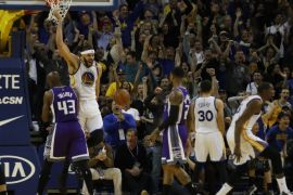 Golden State Warriors center JaVale McGee (2-L) reacts after dunking against the Sacramento Kings during their NBA game at Oracle Arena in Oakland, California, USA, 15 February 2017.