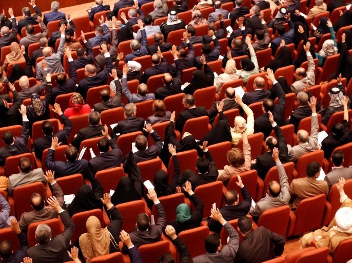 FILE PHOTO Members of the Iraqi parliament gather to vote on Iraq's new government at the parliament headquarters in Baghdad, September 8, 2014. REUTERS/Thaier Al-Sudani/File Photo