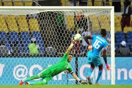 Essam El Hadary of Egypt saves a penalty of Herve Koffi of Burkina Faso during the 2017 Africa Cup of Nations semi final match between Burkina Faso and Egypt at the Libreville Stadium in Gabon on 01 February 2017.