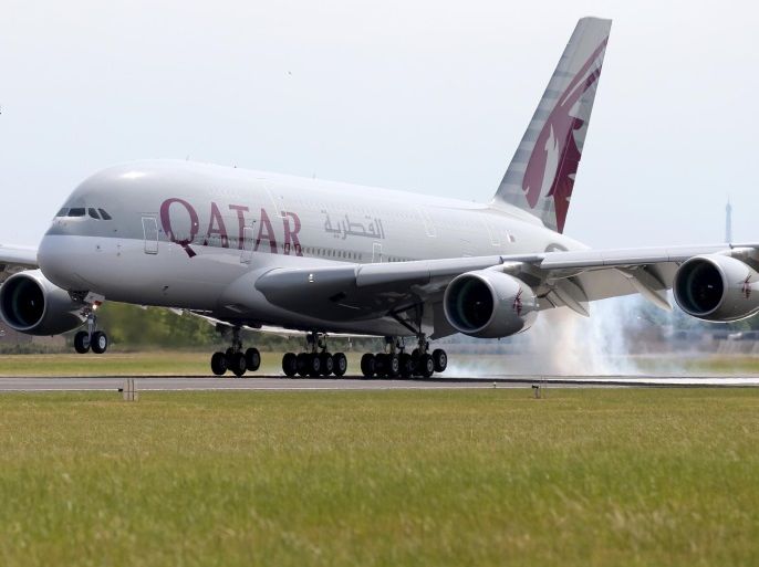 A Qatar Airways Airbus A380, the world's largest jetliner touches down at Le Bourget airport one day before the opening of the 51st Paris Air Show, June 14, 2015. REUTERS/Pascal Rossignol