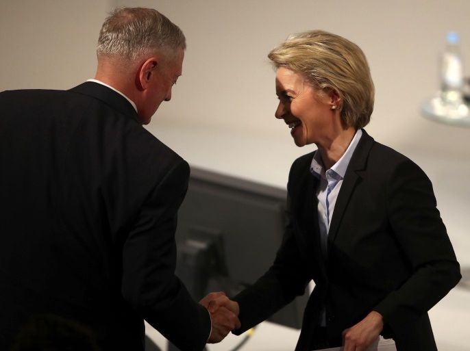 German Defence Minister Ursula von der Leyen shakes hands with U.S. Defense Secretary Jim Mattis at the start of the 53rd Munich Security Conference in Munich, Germany, February 17, 2017. REUTERS/Michael Dalder