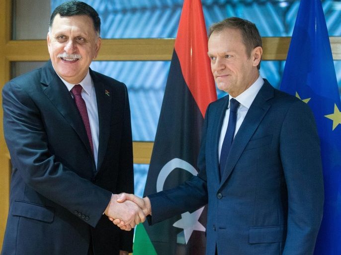 Prime Minister of Libya Fayez al-Sarraj (L) is welcomed by the President of the European Council Donald Tusk (R) ahead of a meeting at EU Council in Brussels, Belgium, 02 February 2017.