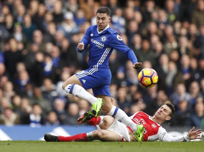 Britain Football Soccer - Chelsea v Arsenal - Premier League - Stamford Bridge - 4/2/17 Chelsea's Eden Hazard in action with Arsenal's Laurent Koscielny Action Images via Reuters / John Sibley Livepic EDITORIAL USE ONLY. No use with unauthorized audio, video, data, fixture lists, club/league logos or "live" services. Online in-match use limited to 45 images, no video emulation. No use in betting, games or single club/league/player publications. Please contact your account representative for further details.