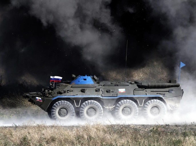 A Russian 8x8 wheeled amphibious armoured personnel carrier (APC) BTR-80 competes in the 'Air defense battle masters' competition during the International Army Games 2015 at the Yeysk, Russia, 09 August 2015. Military professionals of armies from Azerbaijan, Angola, Armenia, Belarus, Venezuela, Egypt, India, Kazakhstan, Kyrgyzstan, China, Kuwait, Mongolia, Nicaragua, Pakistan, Russia, Serbia and Tajikistan take part in the International Army Games 2015 held in Russia on ten various grounds from 01 to 15 August 2015 to define the strongest military professionals in 14 disciplines. EPA/MAXIM SHIPENKOV