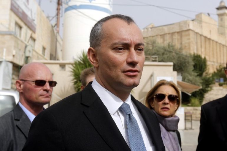 United Nations Special Coordinator for the Middle East Peace Process, Nickolay Mladenov walks with observers of the Temporary International Presence in Hebron (TIPH) as they visit al-Shuhada street and Ibrihimi mosque in the West Bank city of Hebron, 04 November 2015.