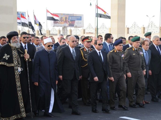 A handout photograph made available by the Egyptian Presidency shows Egyptian President Abdel Fattah al-Sisi (4-L) attending an official funeral former Secretary-General of the United Nations Boutros Boutros-Ghali, in Cairo, Egypt, 18 February 2016. People attending are (L-R) Pope Tawadros II, head of the Egyptian Coptic Orthodox Church, Sheikh of Al-Azhar Ahmed al-Tayeb, Prime Minister Sherif Ismail, and Egyptian Defense Minister Sedki Sobhi (5-L). Former UN secretary general Boutros Boutros-Ghali died on 16 February at the age of 93. EPA/EGYPTIAN PRESIDENCY/HANDOUT