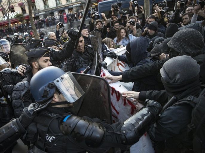 French riot police clashes with protesters during a demonstration to support Theo and against police violence in Paris, France, 18 February 2017. Theo, a young man, was hospitalised for an emergency surgery after he was allegedly sodomized with a truncheon during a police check on 02 February 2017. The incident sparked violent protests in the Paris suburb, one police officer is now charged with rape.
