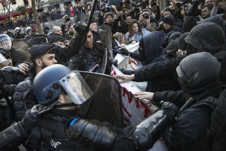 French riot police clashes with protesters during a demonstration to support Theo and against police violence in Paris, France, 18 February 2017. Theo, a young man, was hospitalised for an emergency surgery after he was allegedly sodomized with a truncheon during a police check on 02 February 2017. The incident sparked violent protests in the Paris suburb, one police officer is now charged with rape.