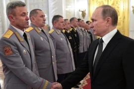 Russian President Vladimir Putin (R) meets with senior officers promoted to higher positions and awarded higher military special ranks at the Kremlin in Moscow, Russia, 07 December 2016. EPA/ALEXEY NIKOLSKY / SPUTNIK / KREMLIN POOL MANDATORY CREDIT