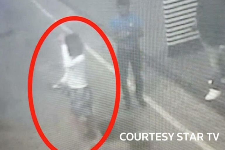 A woman who was detained at Kuala Lumpur airport, identified from CCTV footage at the airport and who was alone when she was apprehended, according to police in a statement, is seen circled in red in this still frame taken from video released February 16, 2017, showing CCTV footage courtesy of Star TV. MANDATORY CREDIT STAR TV Via REUTERS TV ATTENTION EDITORS - EDITORIAL USE ONLY. NO RESALES. NO ARCHIVE. BROADCASTERS: NO ACCESS MALAYSIA, MUST ON SCREEN CREDIT "STAR TV" DIGITAL: NO ACCESS MALAYSIA. MUST ON SCREEN CREDIT "STAR TV" . MANDATORY CREDIT. MALAYSIA OUT.