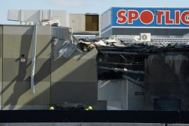 The scene where a light plane crashed into the back of a building at Essendon airport in Melbourne, Australia, February 21, 2017. AAP/Joe Castro/via REUTERS ATTENTION EDITORS - THIS PICTURE WAS PROVIDED BY A THIRD PARTY. EDITORIAL USE ONLY. NO RESALES. NO ARCHIVE. AUSTRALIA OUT. NEW ZEALAND OUT.