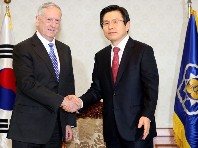 South Korean acting President and Prime Minister Hwang Kyo-ahn (R) shakes hands with US Defense Secretary James Mattis at the Government Building in Seoul, South Korea, 02 February 2017. Mattis began his two-day visit to South Korea in his first overseas trip aimed at underscoring the US security commitment to the Asian ally amid growing threats from North Korea. EPA/YONHAP SOUTH KOREA OUT