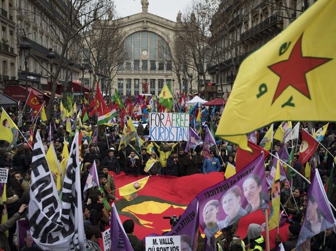 Members of the Kurdish community take part in a demonstration marking the fourth anniversary of the killing of three Kurdistan Workers Party (PKK) members in Paris, France, 07 January 2017. Three Kurdish women, including founding member of the PKK, Sakine Cansiz, were shot dead at a community centre in Paris on 10 January 2013.