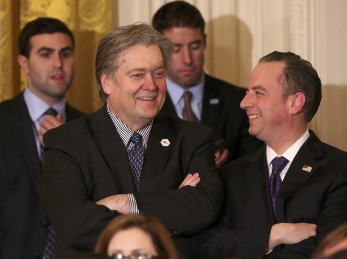 White House Chief Strategist Steve Bannon (L) and White House Chief of Staff Reince Priebus (R) watch as U.S. President Donald Trump announces his nominee for the empty associate justice seat at the U.S. Supreme Court, at the White House in Washington, D.C., U.S. January 31, 2017. REUTERS/Carlos Barria