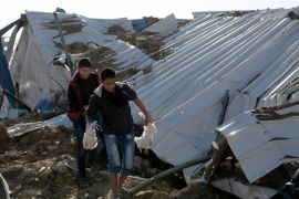 Palestinians inspect the rubble of a destroyed chicken farm which was allegedly hit by an Israeli airstrike overnight in the east of al-Shejaeiya neighbourhood near the border between Israel and Gaza Strip, 07 February 2017.