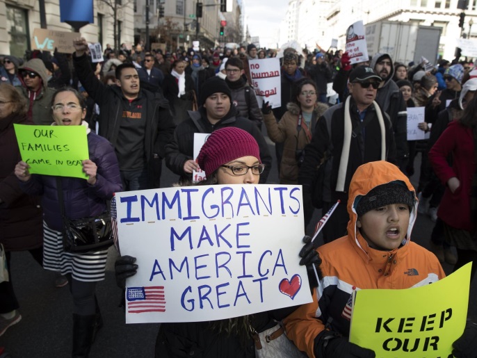 People participate in a march and rally to show support for 'A Day Without Immigrants', in Washington, DC, USA, 16 February 2017. A Day Without Immigrants is a national one-day event in which businesses strike to show opposition to US President Donald J. Trump's immigration policies and to show solidarity to immigrant workers.