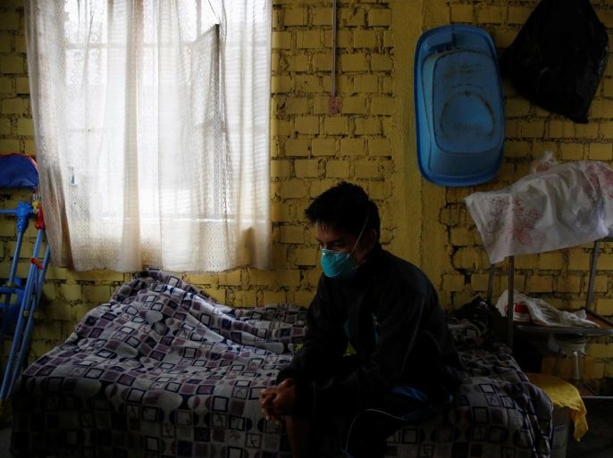 Jose Luis, 20, worked in a print shop before being diagnosed with tuberculosis six months ago, seen at his home in Carabayllo in Lima, Peru July 14, 2016. REUTERS/Mariana Bazo SEARCH "TB HOPE" FOR THIS STORY. SEARCH "THE WIDER IMAGE" FOR ALL STORIES.