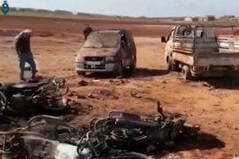 A still image taken from a video posted on social media uploaded on February 24, 2017, shows people inspecting the damage at a site of an Islamic State car bomb explosion, said to be in Sousian village near al-Bab, Syria. Social Media/ via REUTERS TV ATTENTION EDITORS - THIS IMAGE WAS PROVIDED BY A THIRD PARTY. EDITORIAL USE ONLY. NO RESALES. NO ARCHIVE.