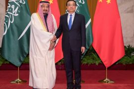 Chinese Premier Li Keqiang (R) shakes hands with Saudi Arabia's King Salman bin Abdulaziz Al Saud (L) at Great Hall of the People on March 17, 2017 i REUTERS/Lintao Zhang/Pool *** Local Caption *** Li Keqiang;Salman bin Abdulaziz Al Saud
