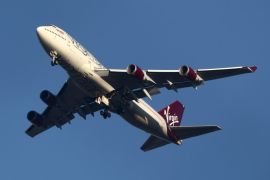 LONDON, ENGLAND - DECEMBER 29: The suspected Virgin Atlantic Boeing 747 jumbo jet passenger plane hovers in the sky as it reportedly prepares for a non-standard landing at Gatwick airport in West Sussex on December 29, 2014 in London, England. Flight VS43 was traveling to Las Vegas and is returning to the airport due to a reported technical issue with one of the landing gears. (Photo by Jordan Mansfield/Getty Images)