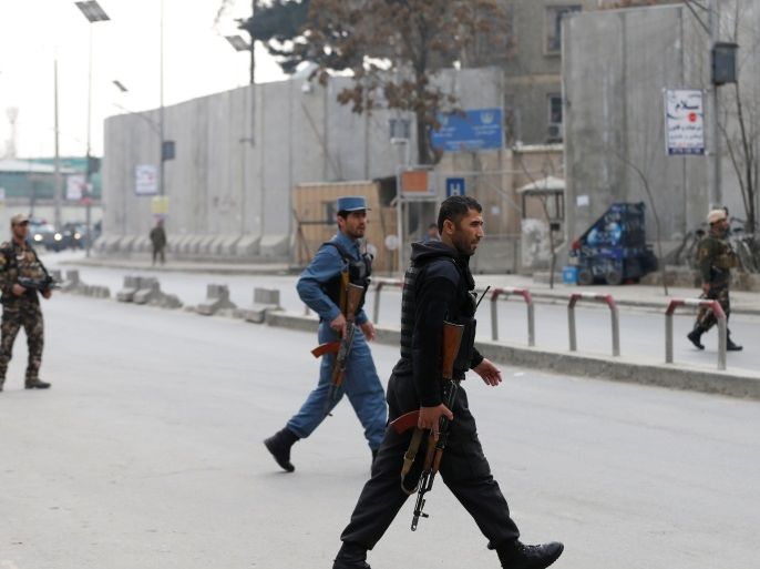 Afghan policemen arrive at the site of a blast and gunfire in Kabul, Afghanistan March 8, 2017. REUTERS/Mohammad Ismail