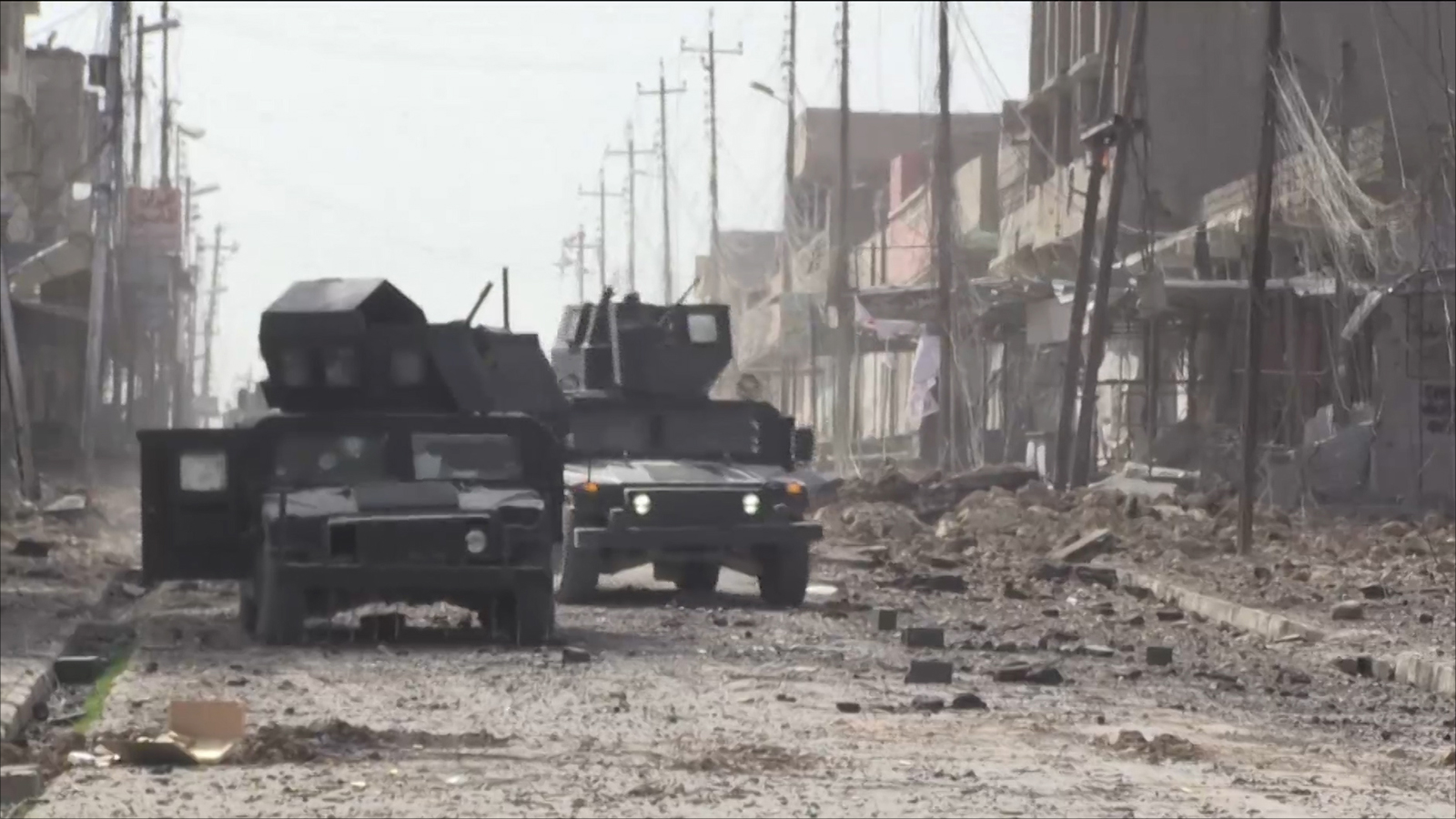 ‪القوات العراقية مدعومة من التحالف الدولي‬ (الجزيرة)