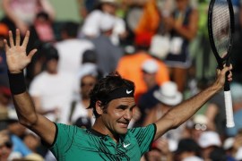 Mar 30, 2017; Miami, FL, USA; Roger Federer of Switzerland waves to the crowd after his match against Tomas Berdych of the Czech Republic (not pictured) in a men's singles quarter-final during the 2017 Miami Open at Crandon Park Tennis Center. Federer won 6-2, 3-6, 7-6(6). Mandatory Credit: Geoff Burke-USA TODAY Sports