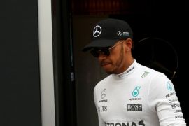 Formula One - F1 - Test session - Barcelona-Catalunya racetrack in Montmelo, Spain - 28/02/17. Lewis Hamilton of Mercedes walks by the paddock. REUTERS/Albert Gea