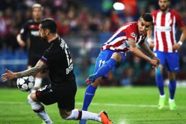 MADRID, SPAIN - MARCH 15: Roberto Hilbert of Bayer Leverkusen challenges Angel Correa of Atletico Madrid during the UEFA Champions League Round of 16 second leg match between Club Atletico de Madrid and Bayer Leverkusen at Vicente Calderon Stadium on March 15, 2017 in Madrid, Spain. (Photo by Lars Baron/Bongarts/Getty Images)