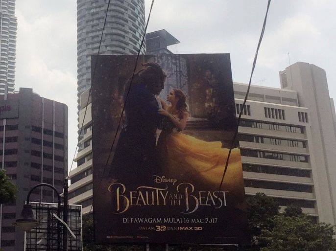 A Beauty and the Beast poster in downtown Kuala Lumpur, Malaysia March 14, 2017. REUTERS/Angie Teo