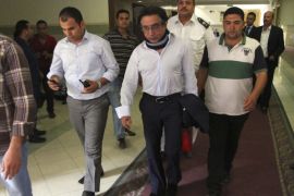 Egyptian steel tycoon Ahmed Ezz is seen at a prosecution office after he left jail, in Cairo, August 7, 2014. Ezz, arrested after the 2011 uprising that ousted Hosni Mubarak, left jail after paying bail and fines in three corruption cases against him, security and judicial sources said. Ezz paid 11 million Egyptian pounds ($1.54 million) in fines on Thursday, having already covered a total of 152 million in bail charges. The former owner of Ezz Steel - the country's la