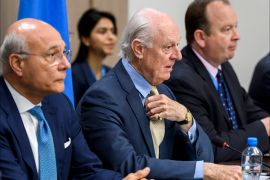 epa05876685 Deputy UN Special Envoy for Syria Ramzy Ezzeldin Ramzy (L) and UN Special Envoy for Syria Staffan de Mistura (C) attend a meeting with Syria's main opposition delegation High Negotiations Committee (HNC) during the Syria peace talks in Geneva, Switzerland, 29 March 2017. EPA/FABRICE COFFRINI / POOL
