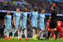MANCHESTER, ENGLAND - MARCH 19: The Manchester City team plead with referee Michael Oliver during the Premier League match between Manchester City and Liverpool at Etihad Stadium on March 19, 2017 in Manchester, England. (Photo by Laurence Griffiths/Getty Images)