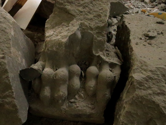 الدمار في متحف مدينة الموصل طال آثارا تعود للحقبة الآشورية(رويترز)