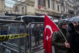ISTANBUL, TURKEY - MARCH 12: A protester stands in front of a police gate blocking the entrance to the Dutch Consulate on March 12, 2017 in Istanbul, Turkey. Security has been increased around the Dutch consulate after people continued to gather outside the consulate protesting action taken against the Turkish foreign minister, who was scheduled to speak in the Dutch city of Rotterdam but was refused entry and his plane barred from landing. In response to the action Turkish President Recep Tayyip Erdogan speaking at a referendum rally on Saturday described the Dutch as ' Nazi remnants and fascists' (Photo by Chris McGrath/Getty Images)