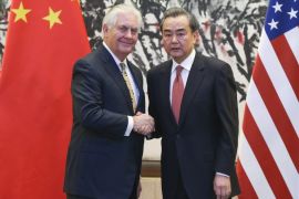 BEIJING, CHINA - MARCH 18: Chinese Foreign Minister Wang Yi (R) shakes hands with U.S. Secretary of State Rex Tillerson after a joint press conference at Diaoyutai State Guesthouse on March 18, 2017 in Beijing, China. Tillerson is on his first visit to Asia as Secretary of State. (Photo by Lintao Zhang - Pool/Getty Images)