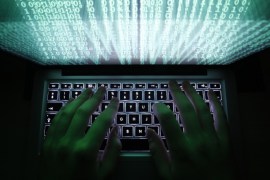 A man types on a computer keyboard in Warsaw in this February 28, 2013 illustration file picture. One of the largest ever cyber attacks is slowing global internet services after an organisation blocking
