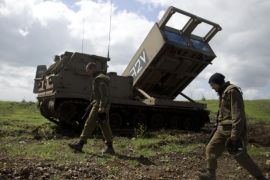 GOLAN HEIGHTS, ISRAEL - MARCH 16: Israeli soldiers are seen next to an M270 Multiple Launch Rocket System during an army drill on March 16, 2016 in Israeli-annexed Golan Heights. Israeli President Reuven Rivlin landed in Moscow last night and on Wednesday begins talks with Russian leaders including President Vladimir Putin. Rivlin bears the distinction of being the first foreign leader to meet with the president since Putin announced the withdrawal of most Russian forc