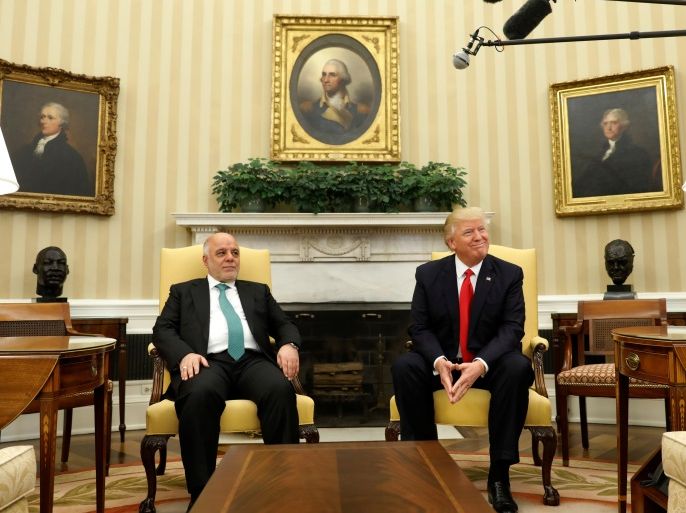 U.S. President Donald Trump meets with Iraqi Prime Minister Haider al-Abadi in the Oval Office at the White House in Washington, U.S., March 20, 2017. REUTERS/Kevin Lamarque