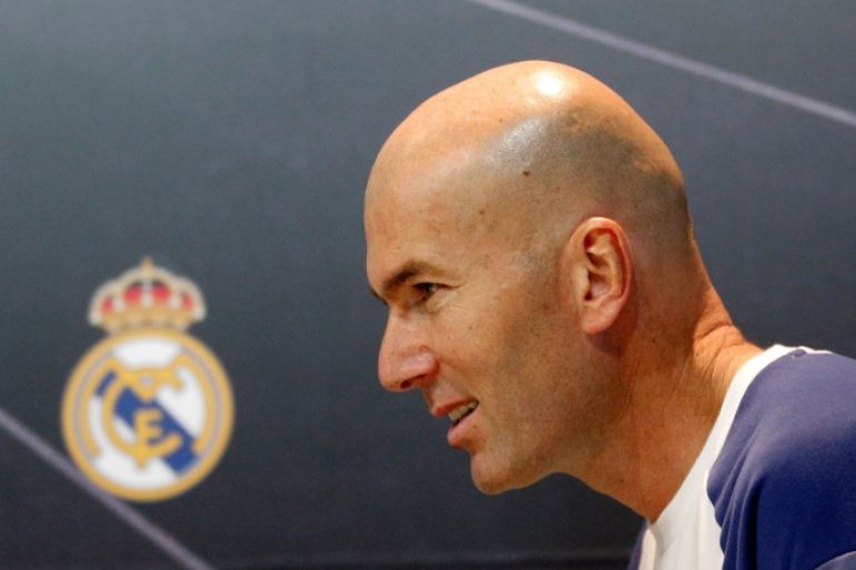 Football Soccer - Real Madrid news conference - Valdebebas sports facility, Madrid, Spain - 2/12/16 - Real Madrid's coach Zinedine Zidane arrives to a news conference after a training session prior to