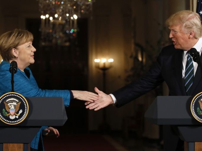 U.S. President Donald Trump and German Chancellor Angela Merkel prepare to shake hands at the conclusion of their joint news conference in the East Room of the White House in Washington, U.S., March 17, 2017. REUTERS/Jim Bourg
