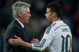 MADRID, SPAIN - APRIL 18: Head coach Carlo Ancelotti (L) of Real Madrid CF shakes hands with his player James Rodriguez (R) after the La Liga match between Real Madrid CF and Malaga CF at Estadio Santiago Bernabeu on April 18, 2015 in Madrid, Spain. (Photo by Gonzalo Arroyo Moreno/Getty Images)