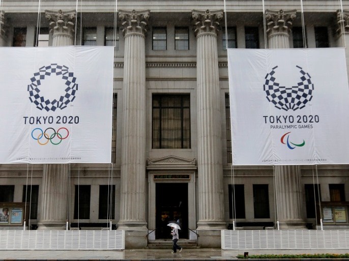 Logos of Tokyo 2020 Olympics and Paralympics are seen on the Mitsui Main Building which is designated as an important national cultural property, as part of the promotional event