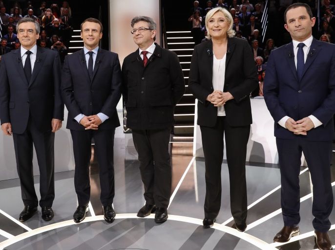 Candidates for the 2017 presidential election (LtoR) Francois Fillon, former French Prime Minister, member of the Republicans and candidate of the French centre-right, Emmanuel Macron, head of the political movement En Marche !, or Onwards !, Jean-Luc Melenchon of the French far left Parti de Gauche, Marine Le Pen, French National Front (FN) political party leader and Benoit Hamon of the French Socialist party (PS) pose before a debate organised by French private TV cha