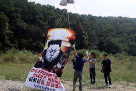 PAJU, SOUTH KOREA - SEPTEMBER 15: North Korean defectors, now living in South Korea, prepare to release balloons carrying propaganda leaflets denouncing recent North Korea's nuclear test, near the Demilitarized Zone (DMZ) on September 15, 2016 in Paju, South Korea. The leaflets also denounce the North Korean government for their human rights abuses. (Photo by Chung Sung-Jun/Getty Images)